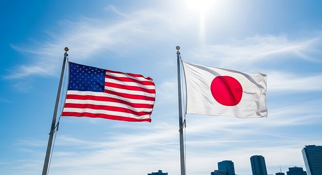 United States and Japan Flags Waving in the Sky.