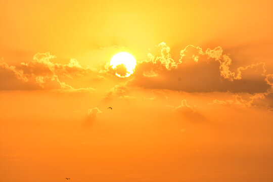 Golden sunrise over the sea in Paralia, Katerini, Greece.