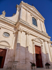 Obraz premium Facade of The Church of Saint George Martyr, Chiesa Madre San Giorgio Martire in Italian, Locorotondo, Itria Valley, province of Bari, Apulia (Puglia), Italy, Europe