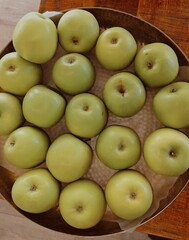 green apples in a basket