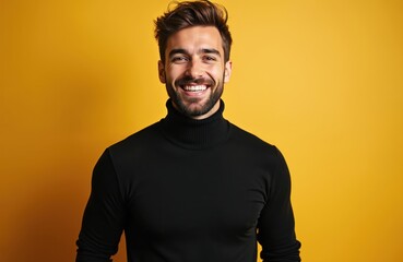 Fototapeta premium Man with beard smiles widely in black turtleneck. He stands against a solid yellow background looking confident and happy. This shot works for lifestyle and fashion.