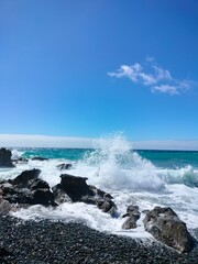 Waves crashing against the rocks at Playa de Garcey, Fuerteventura. A wild and remote beach showcasing the island’s rugged volcanic coastline.