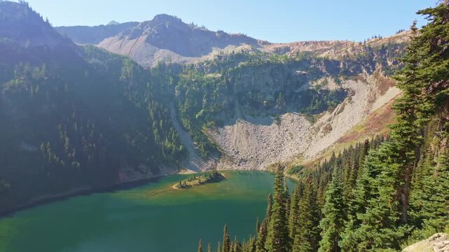 A breathtaking scenic view of the pristine Ann Lake, nestled along the beautiful Maple Pass Trail in the North Cascades