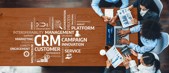 Panorama top view multiracial analyst team use BI dashboard display on laptop screen, analyzing financial data for strategic decision. Fintech analyzes marketing indicators. Concord Amity