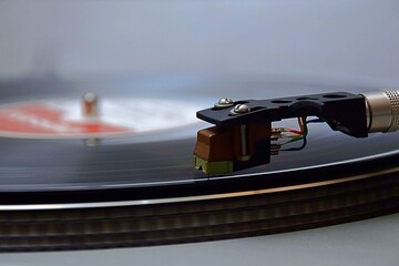 Turntable and cartridge from 1981. Vinyl record.