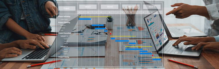 Panorama shot analyst team utilizing BI Fintech to analyze financial report with laptop....