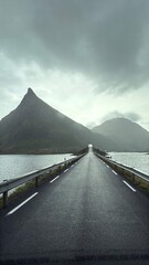 road to infinity surrounded by sea with jagged peaks
