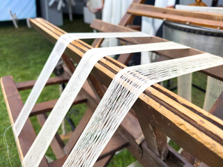 cocoons of white silkworms bred to produce silk , raw silk