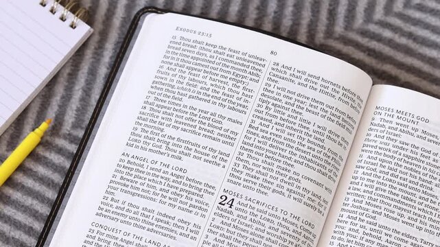 Studying from open holy bible book. Top view. Reading old testament Scriptures, Christian biblical concept.