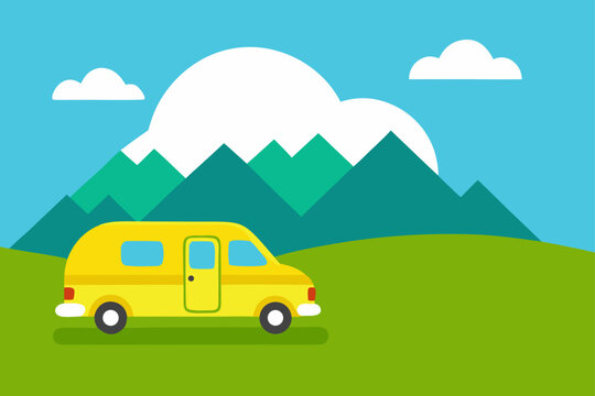 Yellow campervan parked in front of green mountains