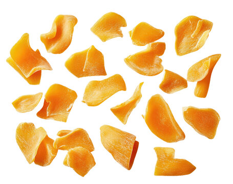 Orange mango slices scattered on black
