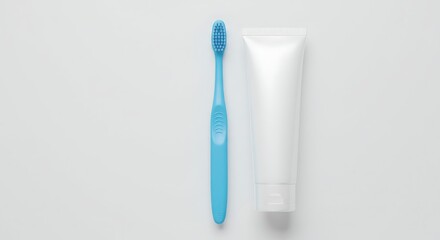 Dental Care Essentials Blue Toothbrush and Blank Tube of Toothpaste on White