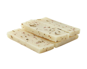 Stack of rectangular, white, herb-speckled cheese sticks on black