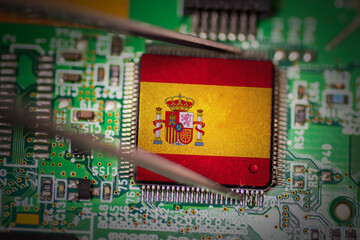 Flag of Spain on a processor, CPU or GPU microchip on a PCB.