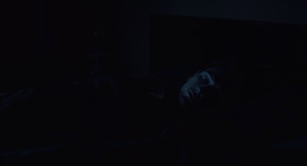 Sleep and Dreams Low-Key Portrait in Darkness