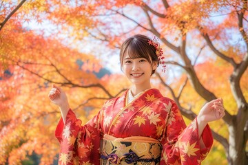 紅葉を背景に鮮やかな和装の女性