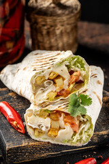Vegetarian shawarma wrap with fries and vegetables