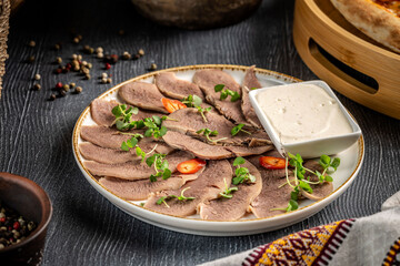 Beef tongue appetizer with creamy horseradish sauce