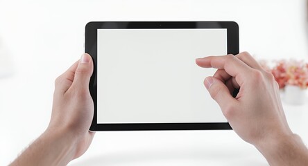 Touchscreen tablet being used on a white background