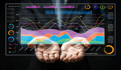 Hands Presenting Dynamic Data Visualizations with Colorful Graphs, Indicators, and Statistical Elements in a Corporate Setting