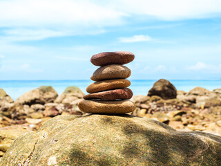 Stone stack zen balance on calm water background sea spa stability concept template relax massage harmony peace, pile pebble at coast ocean nature landscape outdoor.