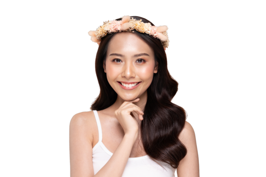 Asian Smiling young Asian woman with floral headband and long dark hair, hand near chin, wearing white tank top, soft natural makeup and bright studio lighting - Powered by Adobe