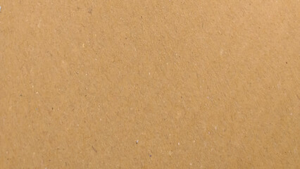 Abstract pattern of beige rough carton, old paper sheet, Background of brown kraft paper or cardboard texture. 