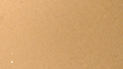Abstract pattern of beige rough carton, old paper sheet, Background of brown kraft paper or cardboard texture. 