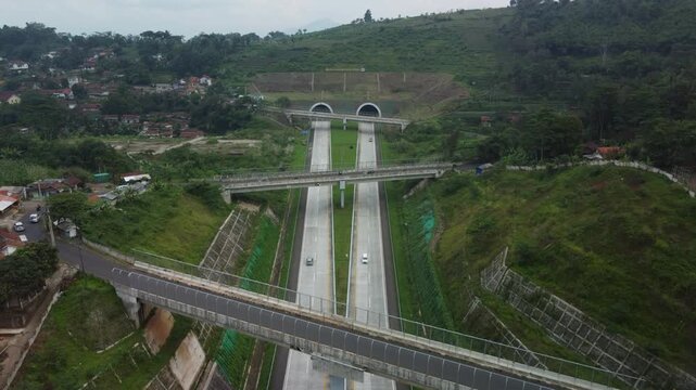 Aerial landscape footage of the Sumedang twin tunnels on Cisumdawu toll road