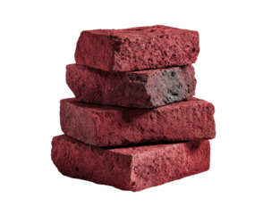 Stack of four rough red bricks on black