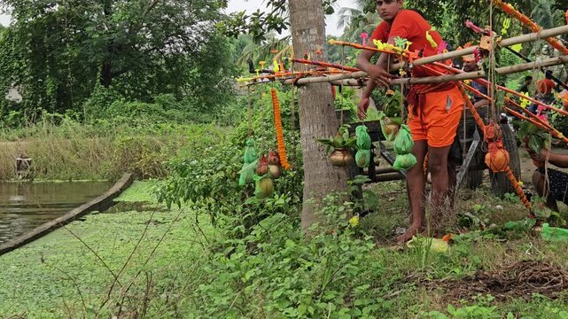 Authentic footage of Hindu devotees carrying beautifully decorated Kanwar Kawad during the sacred Shravan Somwar Sawan Monday pilgrimage in India. Dressed in saffron attire