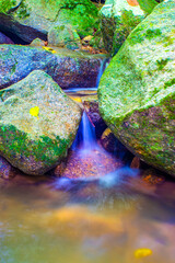 Water Flowing in the forest Waterfall, Thailand.