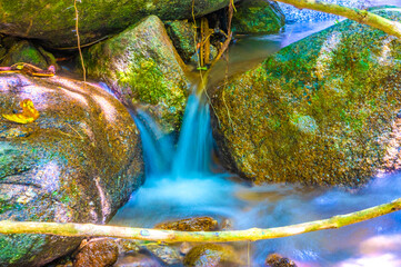 Water Flowing in the forest Waterfall, Thailand.