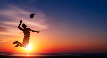Silhouette of a volleyball player jumping against a vibrant sunset.