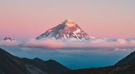 Majestic Mountain Peak at Sunset A Stunning View Amidst the Clouds