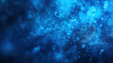 Blue and white abstract background with glittering particles.