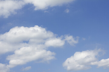 
Blue sky with puffy clouds
