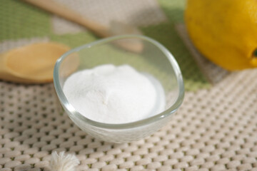 baking soda powder an lemon on a carpet for cleaning 