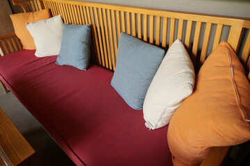 Cozy seating area with colorful cushions in a modern setting