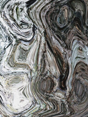 Abstract swirling patterns in tree bark texture, creating a unique and artistic visual with monochrome tones