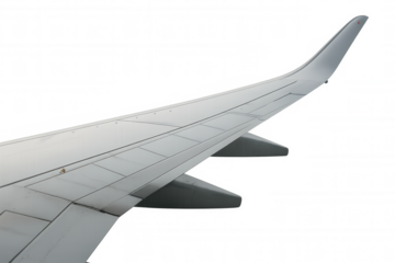 Airplane wing of a commercial jet aircraft in flight, representing aviation, travel, and worldwide transportation