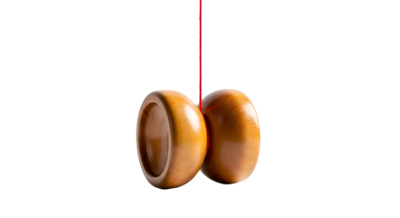 Brown wooden yo-yo suspended in mid-air against a black background