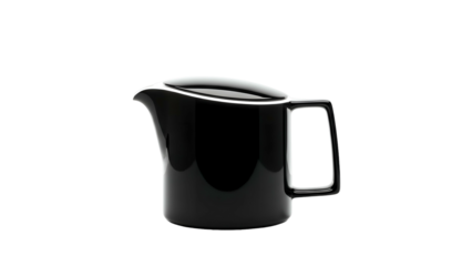 Glossy black creamer with square handle on stark black background