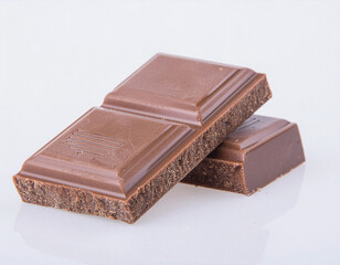 Sweet Milk Chocolate Bar with Rectangular Pieces on White