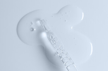 Transparent cosmetic product. Face serum or cleanser gel or body moisturizing gel.