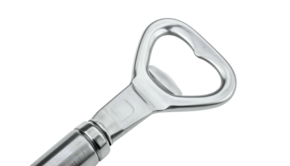 Shiny metal bottle opener on black background, close-up view