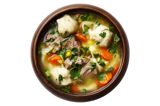 Hot meat pork soup with vegetables and doughboys dumplings in wooden bowl, isolated on white transparent background, concept of New Zealand cuisine