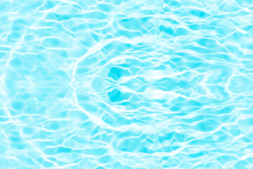 Blue water with ripples on the surface. Defocus blurred transparent blue colored clear calm water surface texture with splashes and bubbles. Water waves with shining pattern texture background.