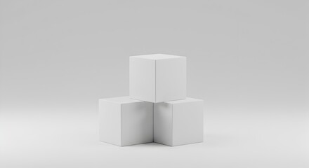 Cluster of three blank white square box mockups arranged geometrically on a clean studio background, ideal for product branding.