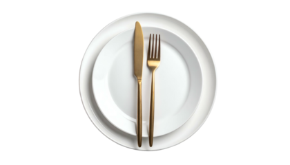 Elegant gold flatware and white plates on a dark backdrop
